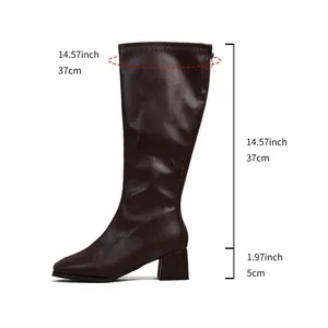 Brown western mid-calf boots in faux leather with block heel and size measurements guide