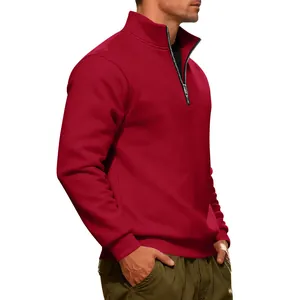 Close-up detail of men's dark red heavy fleece sweatshirt with half-zip stand collar