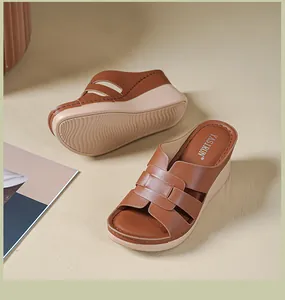Detail of brown platform wedge sandals for women with woven strap design and beige sole