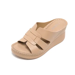 Elegant beige wedge sandals for women with stitched H-strap design and open toe style