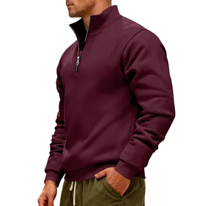 Detail view of men's burgundy half-zip pullover showing stand collar and shoulder fit