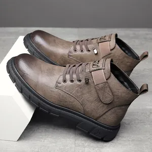 Bottines Martin élégantes en cuir marron pour hommes avec semelles épaisses en gomme