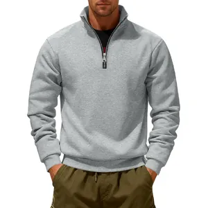 Detailed close-up of a men's heavy gray half-zip sweatshirt featuring a stand collar