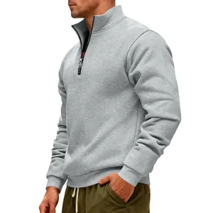 Detail of men's gray heavyweight half-zip sweatshirt with cozy fleece lining.