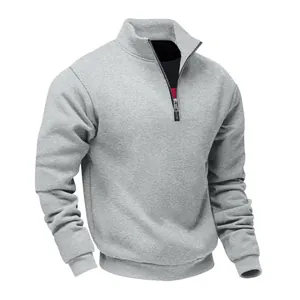 Detail view of a gray men's heavyweight half-zip sweatshirt with a stand collar