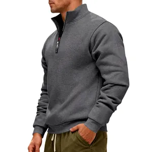 Detail view of men's charcoal grey half-zip sweatshirt with fleece lining.