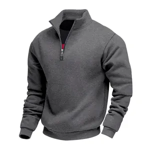 Detailed view of grey heavy-weight fleece sweatshirt with half-zip stand collar design.