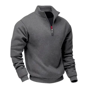 Detail view of a men's heavy grey fleece sweatshirt with quarter-zip and stand collar