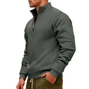 Side profile showing the texture of a men's heavyweight grey half-zip sweatshirt with fleece lining