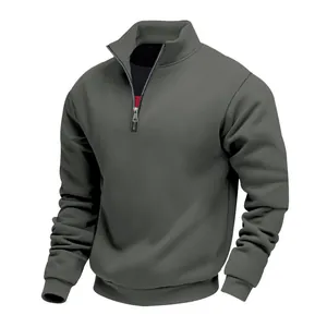 Detailed view of a gray heavyweight half-zip sweatshirt featuring a stand-up collar