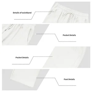 Dettagli in primo piano dei pantaloni sportivi bianchi da uomo con elastico e tasche.