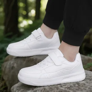 Casual white low-top children's sneakers with Velcro strap for school and sports