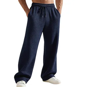 Detailansicht der dunkelblauen Waffel-Struktur-Hose für Herren mit dem Kordelzug