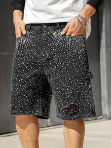 Men's loose black denim shorts with sparkling rhinestones and distressed ripped details.