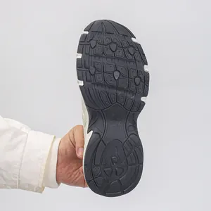 Macro detail showing the durable non-slip rubber sole pattern of casual dad sneakers