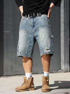 Close-up view of men's carpenter denim shorts featuring rhinestones and distressed holes