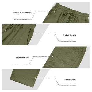 Viste dettagliate dei pantaloni sportivi a costine verde oliva con vita e tasche