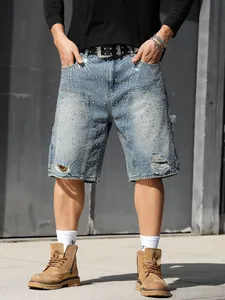Men's rhinestone distressed denim shorts in loose straight fit shown on a model