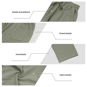 Detailaufnahmen von Bund, Taschen, Beinausschnitt und der Jacquard-Stoffstruktur der Hose.