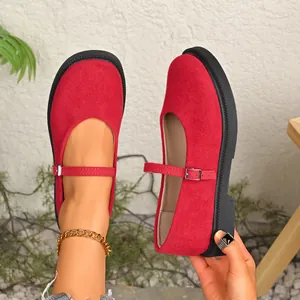 Elegant red suede Mary Jane shoes with round toe and buckle strap, French style details.