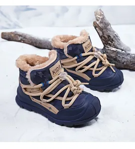 Warm navy blue kids' winter snow boots with thick faux fur lining and camo pattern