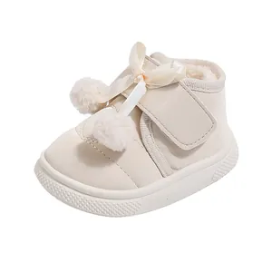 Toddler girl's winter warm fleece-lined shoes with decorative bow and fur pom-poms