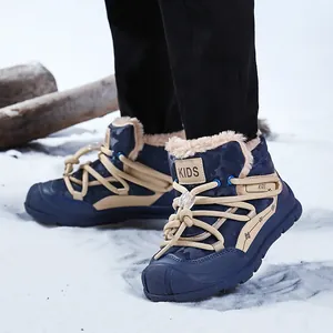 Warm children's winter snow boots with thick faux fur lining and camouflage pattern