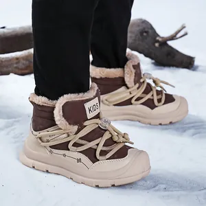Thick warm winter snow boots for kids with faux fur lining in snowy outdoor scene