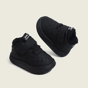 Warm black quilted toddler winter boots featuring faux fur lining and a non-slip soft sole.