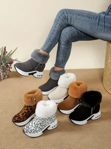 Stylish women's wedge snow boots with faux fur trim in multiple colors and patterns.