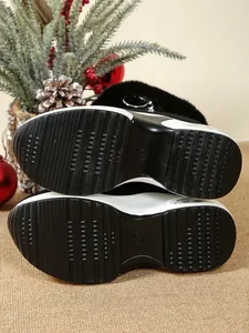 Close-up of the anti-slip thick rubber sole pattern on women's platform snow boots