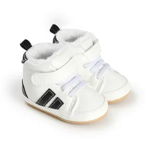 Detailed view of white baby walker shoes featuring warm fleece lining and black stripes