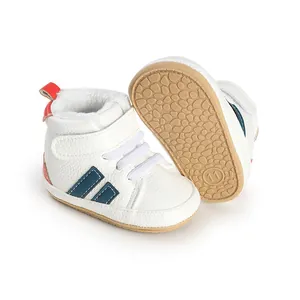 Detail view of fleece-lined white baby walking shoes with non-slip rubber soles