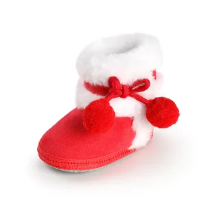 Adorable red soft sole baby princess boots with white faux fur trim and cute pom-poms