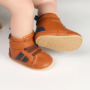 Detailed macro view of brown faux leather baby winter boots with warm fur lining