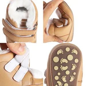 Close-up details of plush lined baby winter boots with soft anti-slip sole and velcro straps