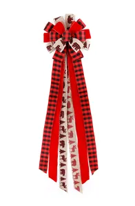 Detailed view of festive multi-layer bow with buffalo plaid and forest animal patterns.