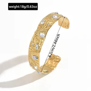 Detailed view of vintage gold stainless steel cuff bracelet with 6.2cm diameter measure