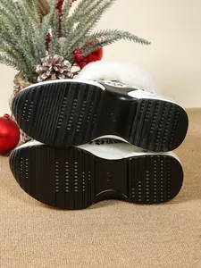 Close-up detail of non-slip thick platform wedge sole for women's winter snow boots