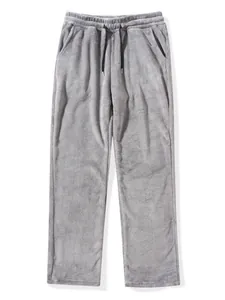 Close-up of grey plush men's oversized loungewear pants with elastic waistband