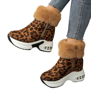 Leopard print platform snow boots for women with warm faux fur trim and wedge sole.