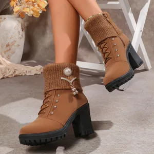 Stylish brown chunky heel boots for women featuring knit cuffs and rhinestone details.