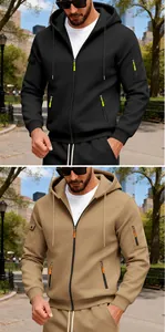 Detail of heavyweight fleece zip-up hoodies in black and khaki with contrast zipper pulls
