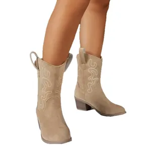 Women's western cowboy boots with V-cut embroidery and chunky heels in tan suede.