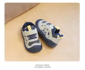 Detail view of winter warm toddler shoes with soft fleece lining and panda cartoon.