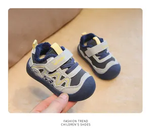 Detail of warm toddler winter shoes with soft sole and cute panda design