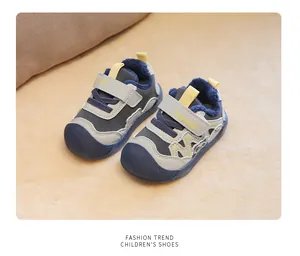 Close-up of warm fleece-lined winter toddler shoes featuring a cute panda cartoon design