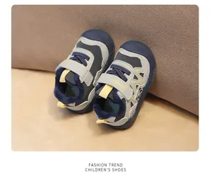 Close-up of warm fleece-lined baby winter shoes with cute panda design