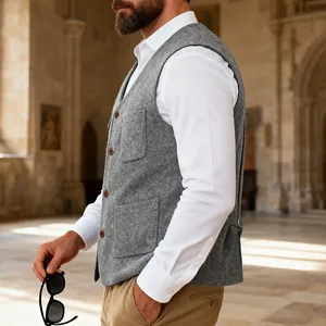 Side view of premium men's grey wool vest showing fabric texture and pocket details.