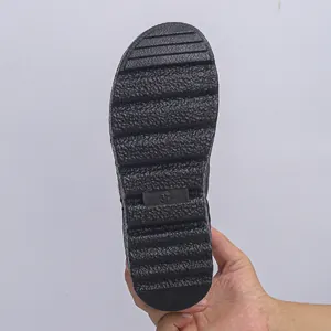 Detailed view of high-traction black non-slip outsole for women snow boots size 37